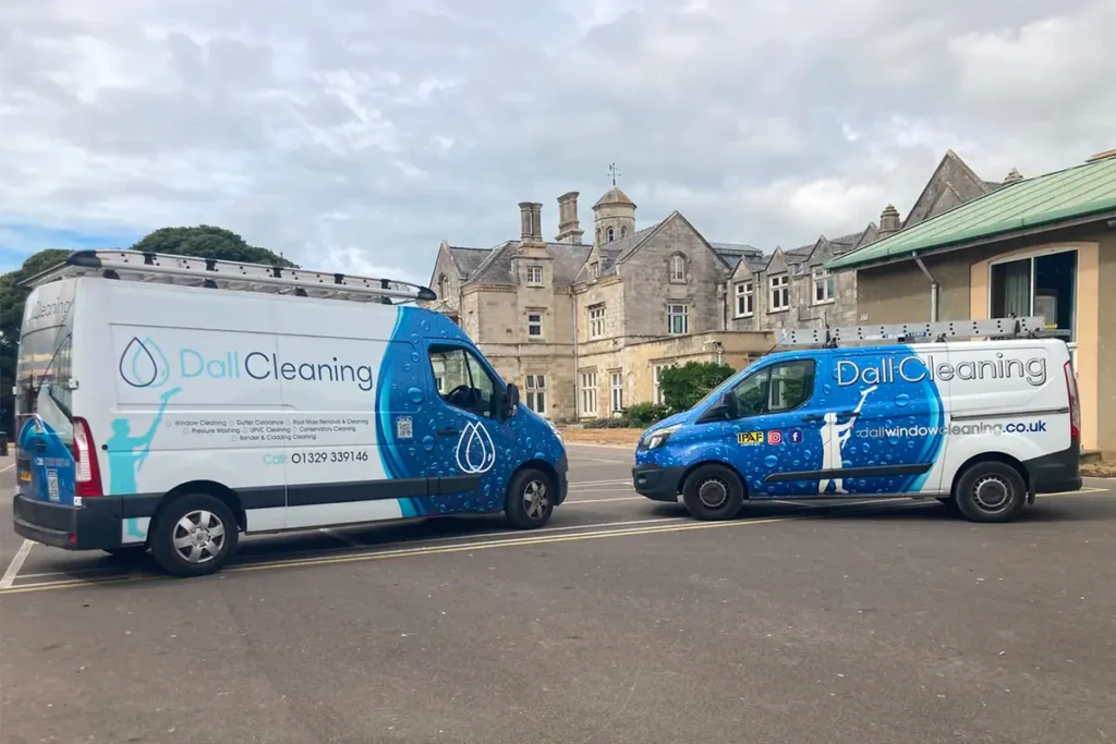 Dall Cleaning Company vans outside Bay House School.